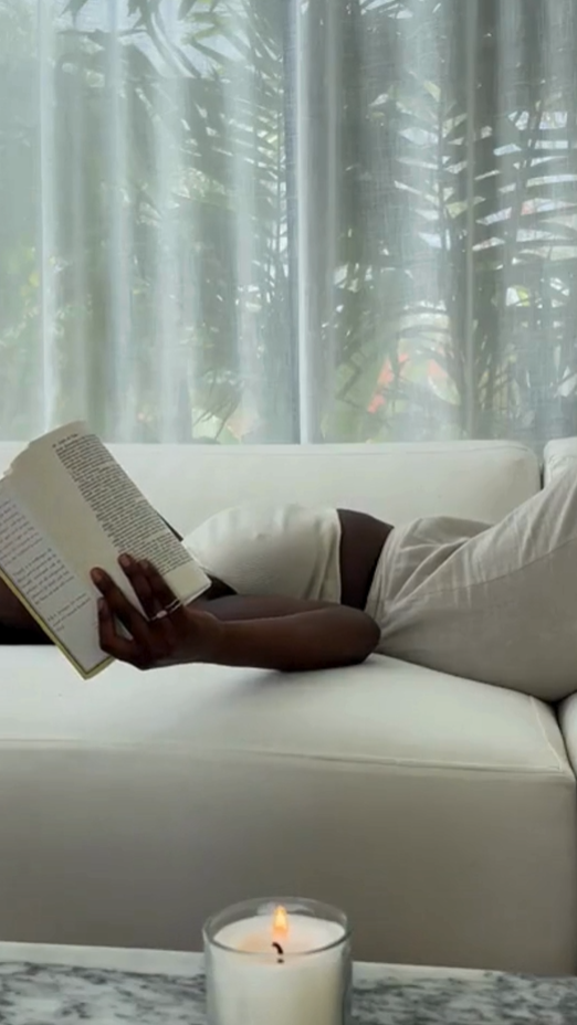 Modern Living Room Aesthetic Reel – neutral tones and cozy decor reading on couch