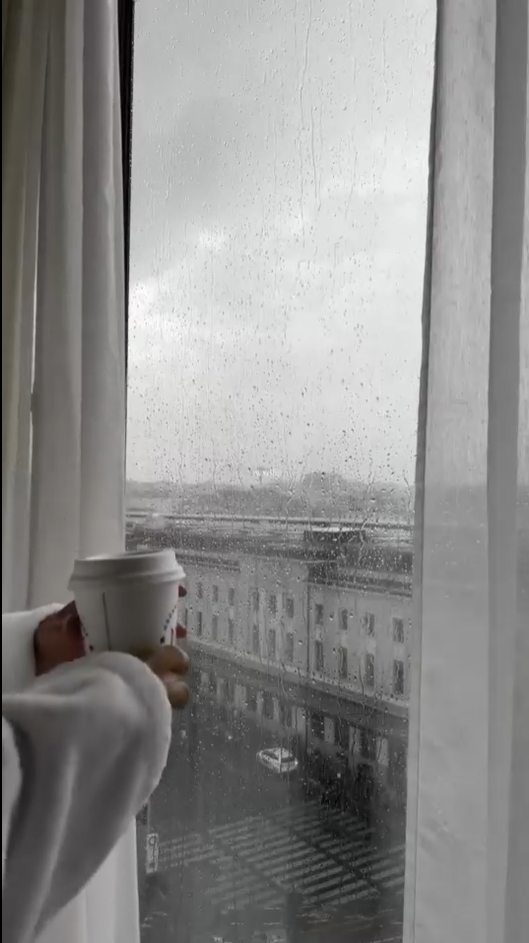Rainy Day Reflections ☕🌧️ City Moments Through the Window"