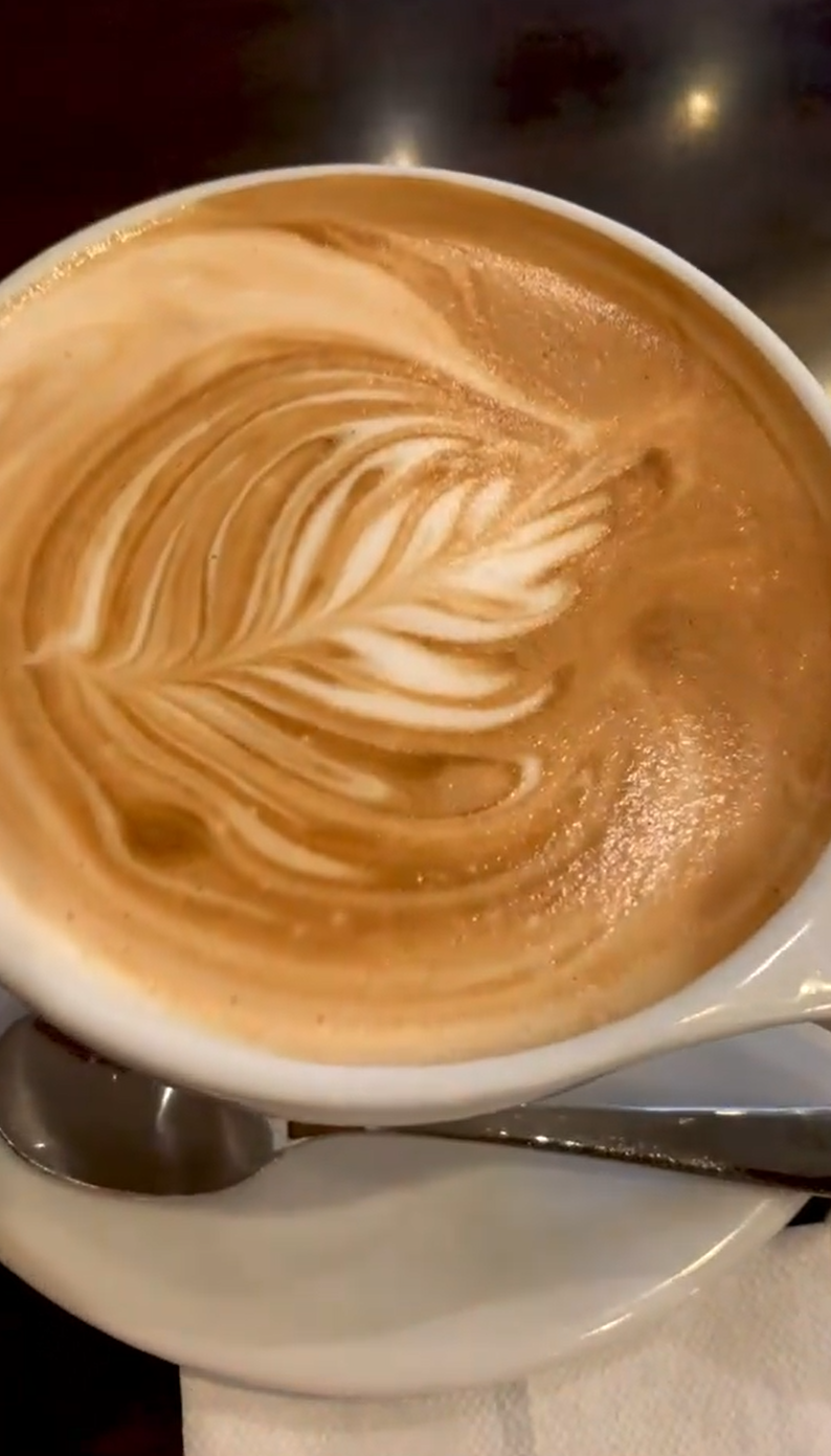 coffee art on top of cappuccino aesthetic